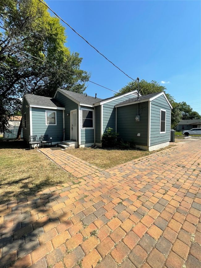 Rear view of house featuring a lawn | Image 12