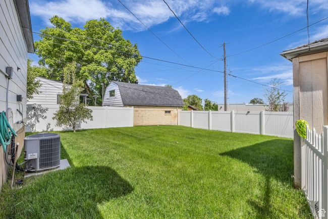 View of yard with central air condition unit | Image 28