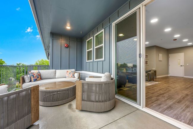 View of patio featuring outdoor lounge area and a balcony | Image 29