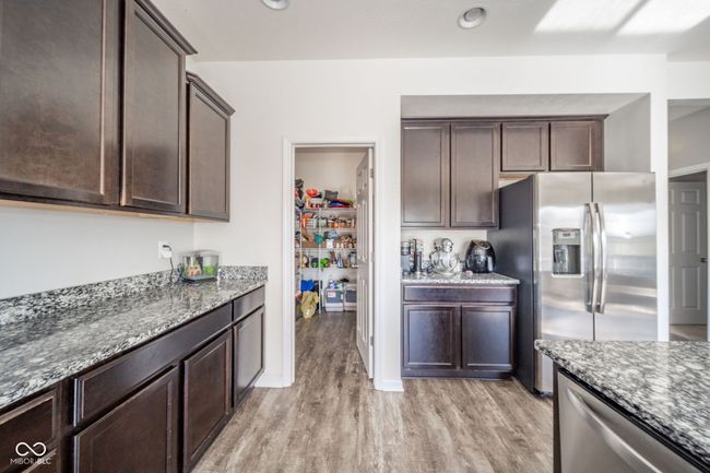 view of walk in pantry | Image 13