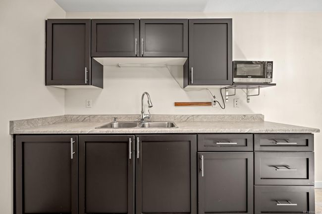 THIS UNIT IS ONE OF THE FEW THAT ARE ALLOWED TO HAVE A DISHWASHER SINCE IT IS ON THE GROUND FLOOR | Image 11