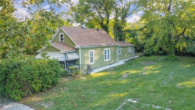 View of side of property featuring a lawn | Image 3