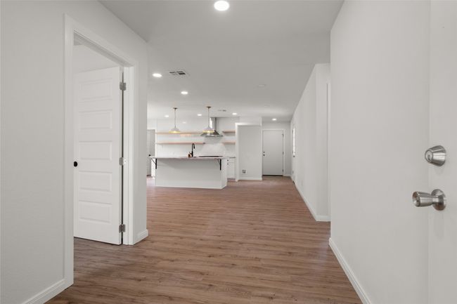 Hall featuring recessed lighting, light wood finished floors, and baseboards | Image 4
