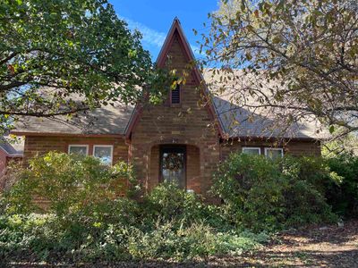 View of english style home | Image 1