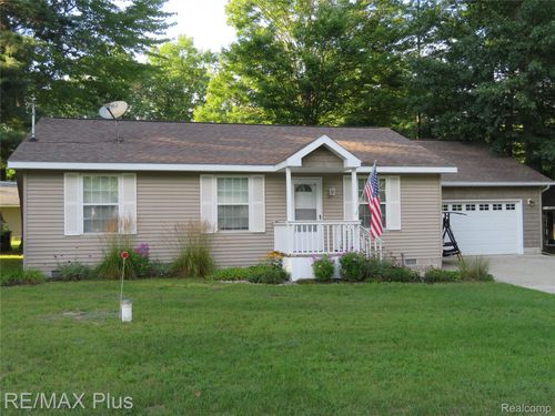 10369 W Higgins Lake Drive, Lyon Township, MI, 48653 | Card Image