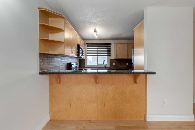 221 - 35 Glamis Green Sw, Home with 2 bedrooms, 1 bathrooms and 1 parking in Calgary AB | Image 22