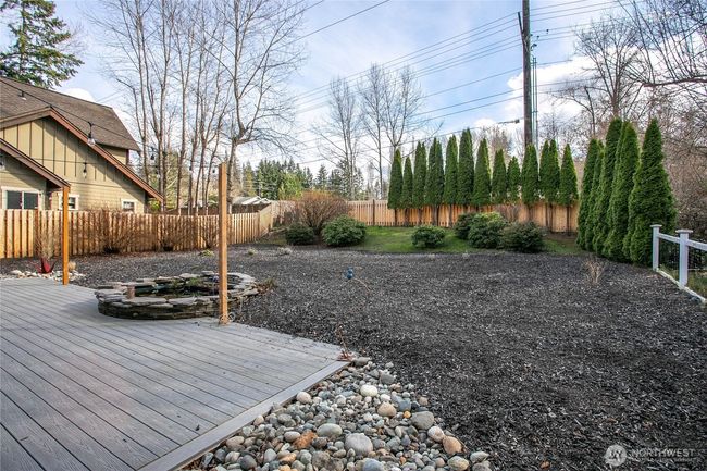 Also has a newer fence around the two sides of the yard. The back area near the fence is part of a conservation easement. | Image 37