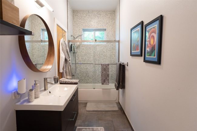 Full bathroom with vanity and shower / bath combination with glass door | Image 8