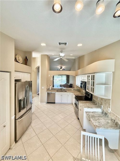b260-8440 Ibis Cove Cir, NAPLES, FL, 34119-7743 | Card Image