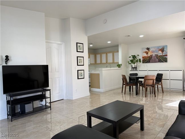 Living area with visible vents, baseboards, marble finish floor, and recessed lighting | Image 6