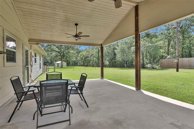 Huge 24x16 Covered patio overlooking Fenced back yard. | Image 32