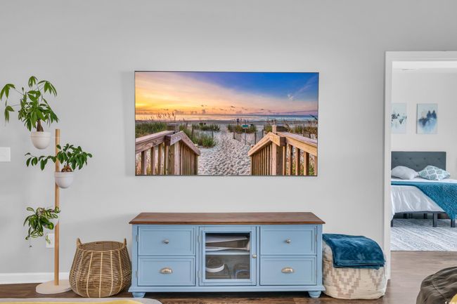 Room details with wood finished floors and baseboards | Image 18