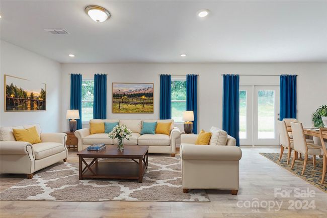 Family room shown with virtual staging | Image 19