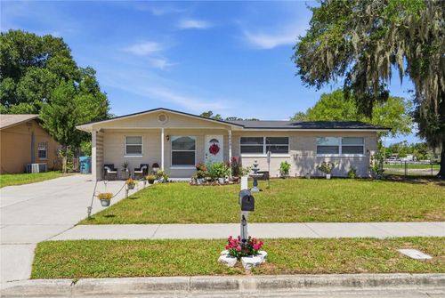 1410 Kozart Ct, ORLANDO, FL, 32811-4013 | Card Image