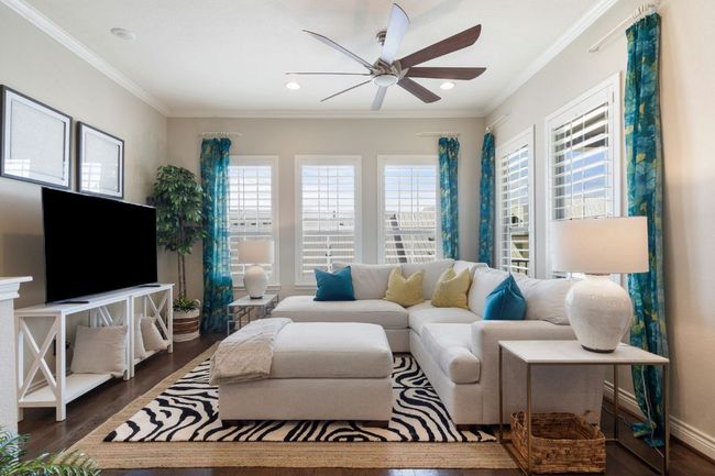 2nd Floor Living area with ceiling fan, dark wood-type flooring, crown molding | Image 7