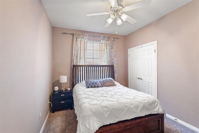 Downstairs bedroom that can be used as a guest room or mother in law suite. | Image 28