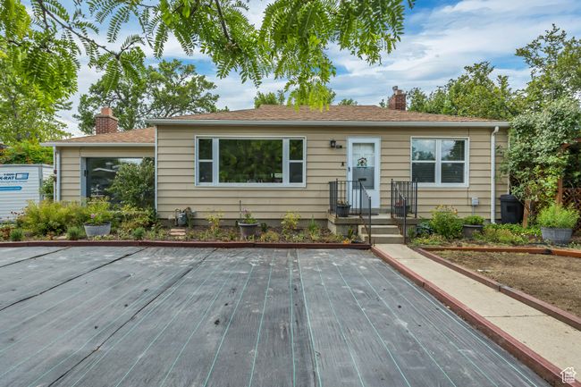 Bungalow-style house featuring a chimney | Image 14