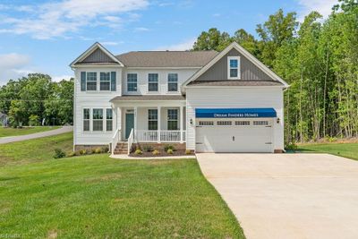 Front of model home for sale | Image 1