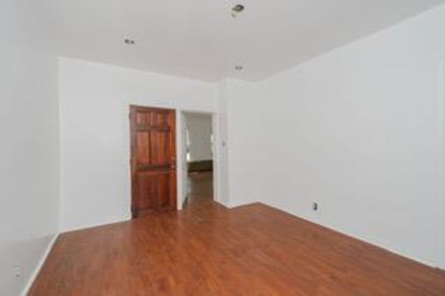 Empty room featuring wood finished floors | Image 27