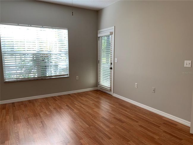 master bedroom opens to screened porch | Image 13