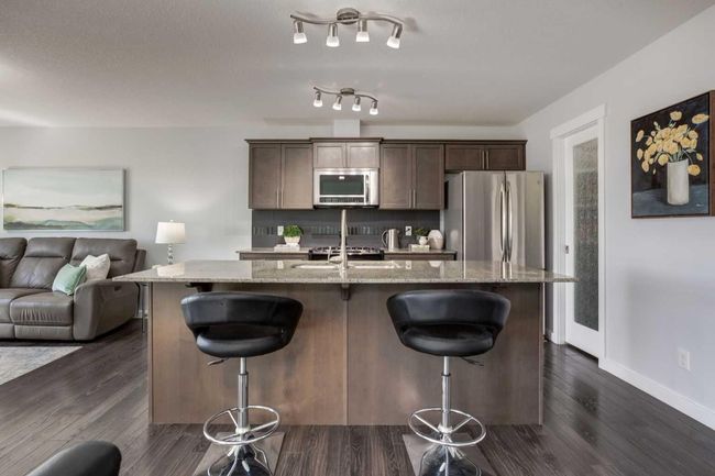 251 Kingsbridge Rd Se, Home with 2 bedrooms, 3 bathrooms and 2 parking in Airdrie AB | Image 5
