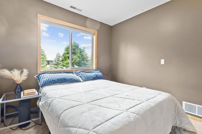 Enjoy huge window overlooking the large green space out this 3rd bedroom | Image 24