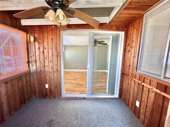 Screen porch towards living room | Image 21