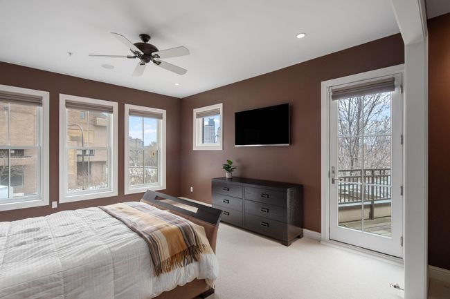 2nd level - Primary suite with private balcony and walk-in closet | Image 23