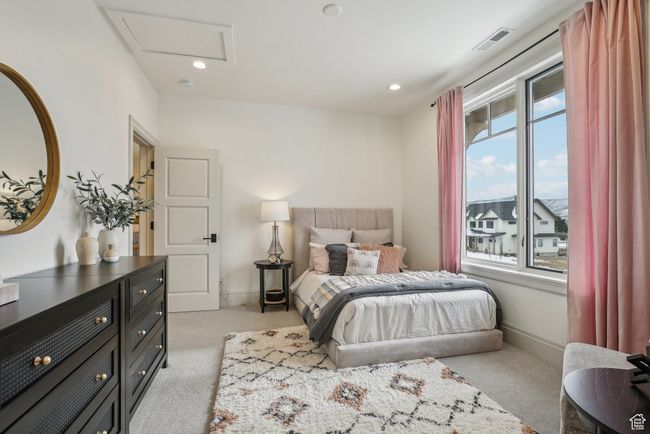 Bedroom with recessed lighting, attic access, visible vents, and light colored carpet | Image 33
