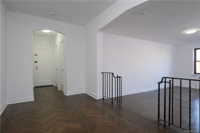 APT. 65 - Gallery / Dining Foyer looking west toward Entry Hall w/ (2) closets. | Image 2