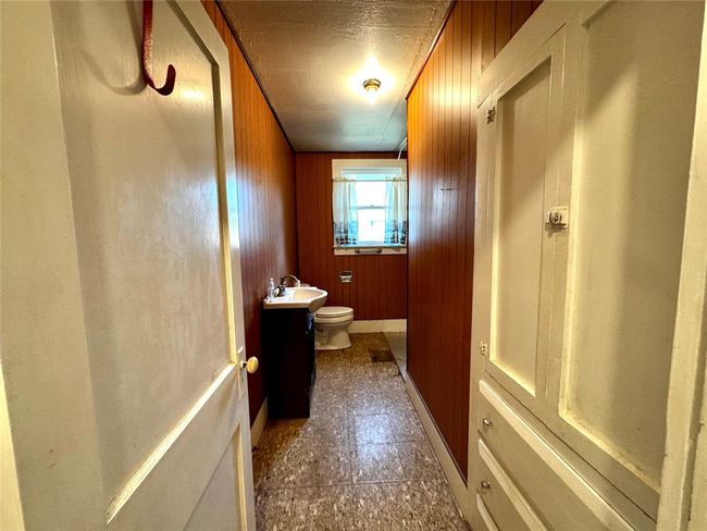 Second bathroom in the hallway between the two bedrooms does have room for a bathtub or shower. | Image 27