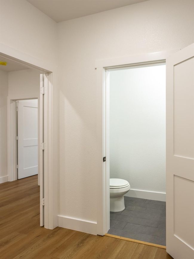 Located conveniently near the common areas, the half-bath is designed with functionality in mind without compromising on style. | Image 31