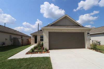 909 Gentle Moss Drive, House other with 3 bedrooms, 2 bathrooms and null parking in Magnolia TX | Image 1