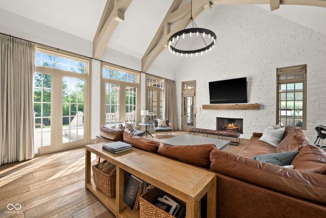 Hearth Room with fireplace, leading to sunroom | Image 44