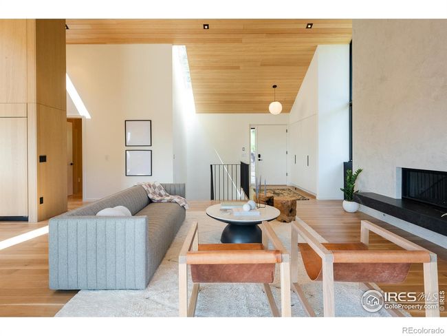 From the living area a light-filled stairway leads to the lower level | Image 27