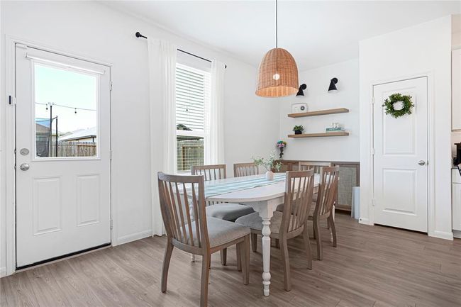 Seamless flow from kitchen to dining—ideal for family meals and entertaining. | Image 11