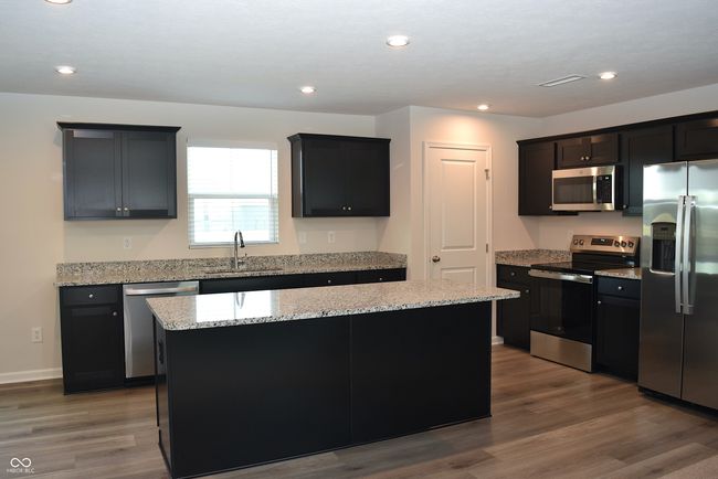 all appliances included ~ upgraded granite tops | Image 16