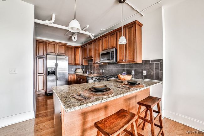 Kitchen with Breakfast Bar | Image 12