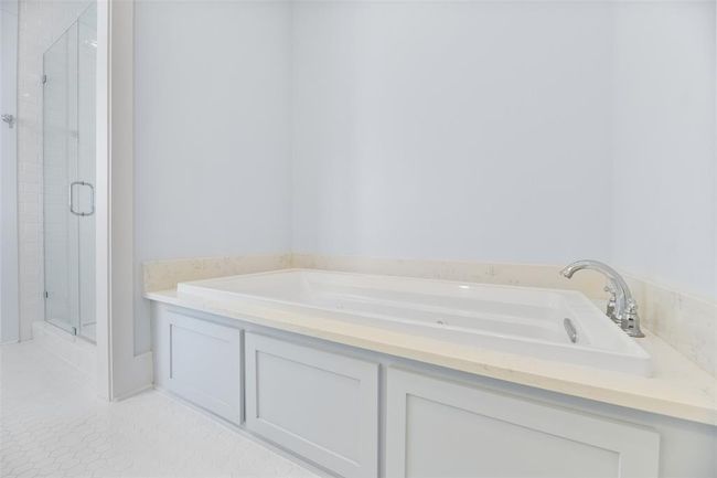 Large whirlpool tub is the perfect place to unwind. | Image 28