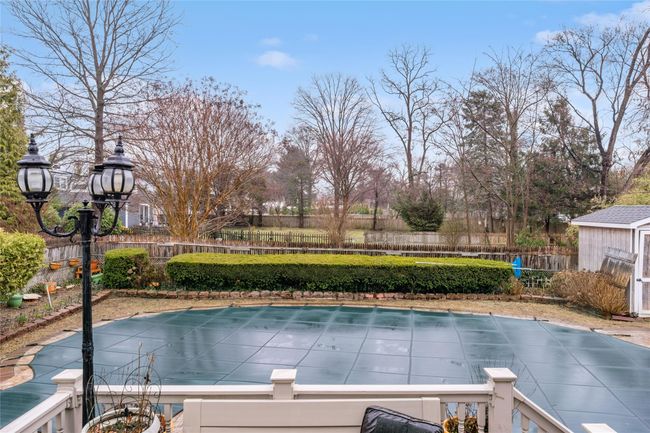 View of pool with a fenced in pool and fence | Image 16