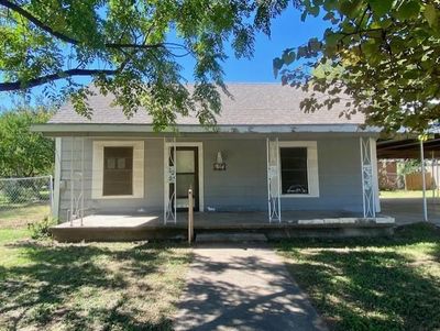 Bungalow-style house with covered porch | Image 1