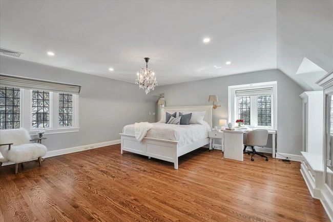 Second view of primary bedroom; large enough to accommodate a desk and is flooded with light! | Image 13
