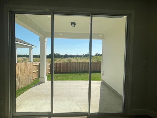 Doorway featuring plenty of natural light | Image 13