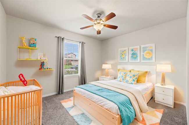 The thoughtfully designed layout of your third bedroom allows for natural light to flood the room, creating a warm and welcoming atmosphere. | Image 19
