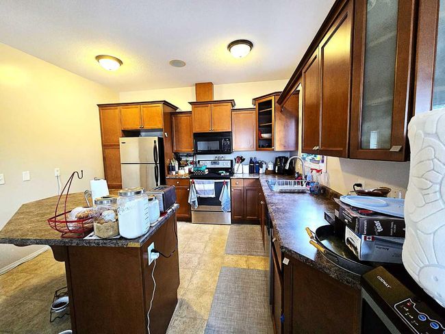 108 Moberly Road, Home with 4 bedrooms, 4 bathrooms and 3 parking in Grande Cache AB | Image 6