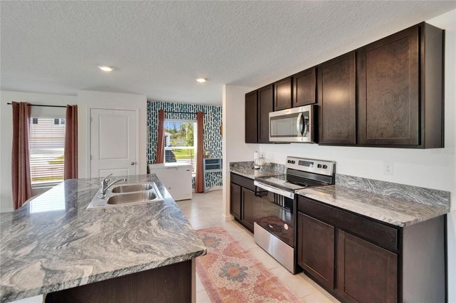 16894 Delia St, House other with 4 bedrooms, 3 bathrooms and null parking in WIMAUMA FL | Image 6