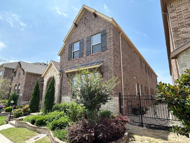 View of side of property featuring brick siding | Image 4