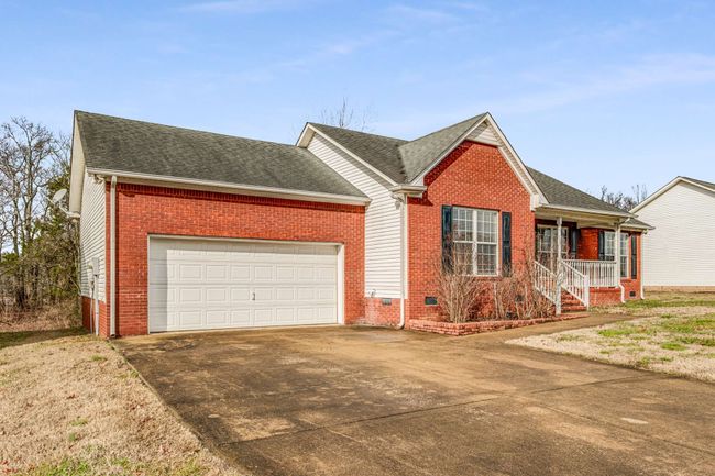 Wide driveway for ease of use and guest parking | Image 34