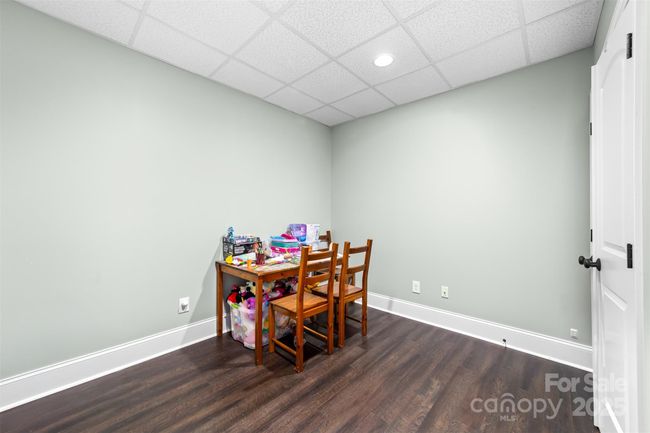 One of two flex rooms in the basement with a large closet. | Image 32