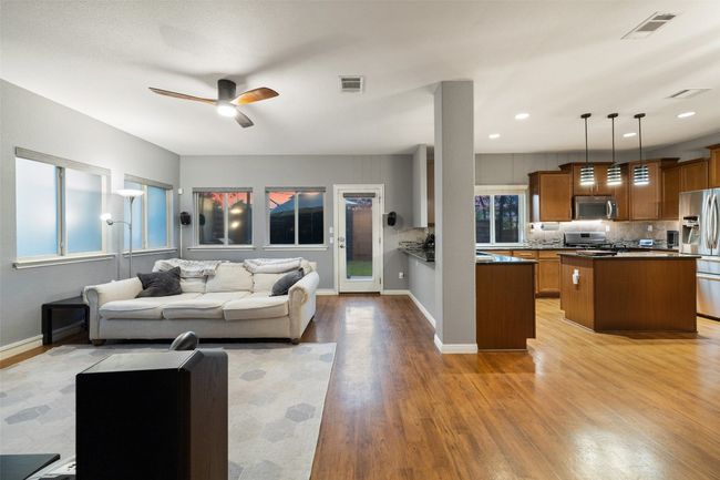 Great floor plan with open kitchen, dining and living on first floor. | Image 6